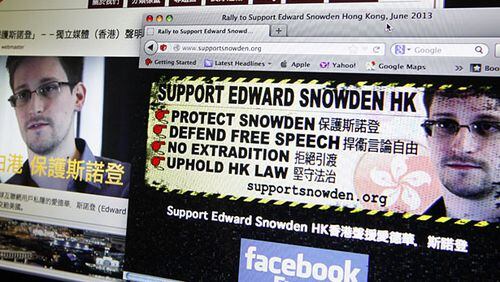 Websites supporting Edward Snowden, former CIA employee who leaked top-secret documents about sweeping U.S. surveillance programs, are displayed on a computer screen in Hong Kong Thursday, June 13, 2013.