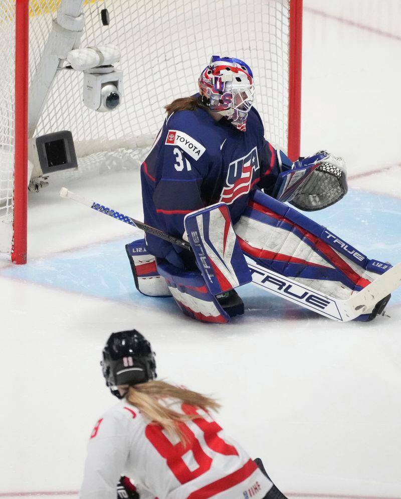 Canada's Julia Gosling (88) scores on United States goaltender Aerin Frankel (31) during the second period in the final at the IIHF Women's World Hockey Championships in Utica, N.Y., Sunday, April 14, 2024. (Christinne Muschi/The Canadian Press via AP)