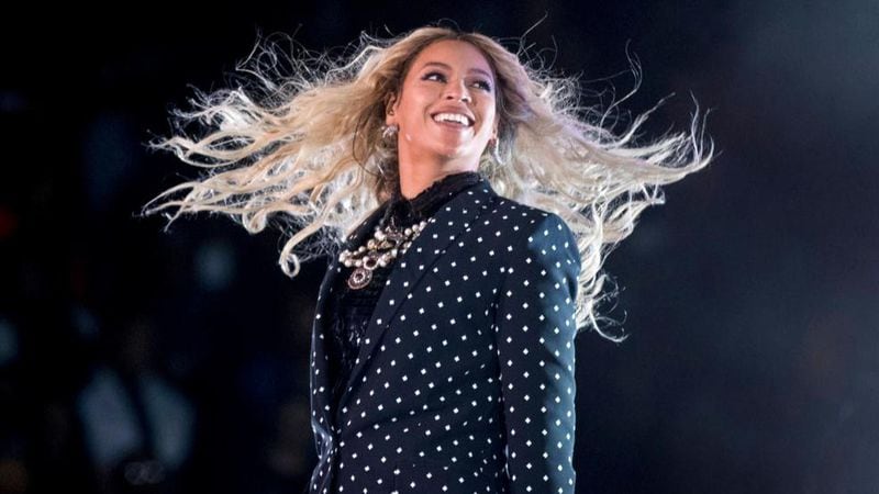 FILE - This Nov. 4, 2016, file photo shows Beyonce performing at a Get Out the Vote concert for Democratic presidential candidate Hillary Clinton in Cleveland. Forbes announced that Beyonce was the highest earning woman in the music industry. The outlet says she earned $105 million over a year-long period that ended in June.