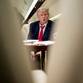
                        FILE — Former President Donald Trump on his plane flying to Columbia, S.C., for a stop in his 2024 campaign, on Jan. 28, 2023. The indictment unveiled on Tuesday, Aug. 1, 2023, accused Trump of enlisting six co-conspirators in “his criminal efforts to overturn the legitimate results of the 2020 presidential election and retain power.” (Doug Mills/The New York Times)
                      