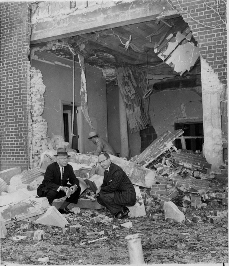 Mayor William Hartsfield and Rabbi Jacob Rothschild sift through rubble hours after The Temple was bombed in 1958. Civil leaders called the dynamiting ‘stupid, vicious, senseless.’ (AJC file)