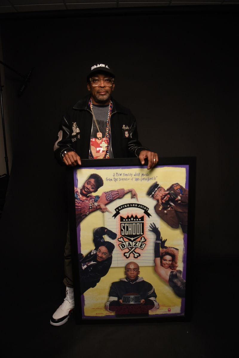 Director Spike Lee with a poster of his 1988 film, "School Daze."
