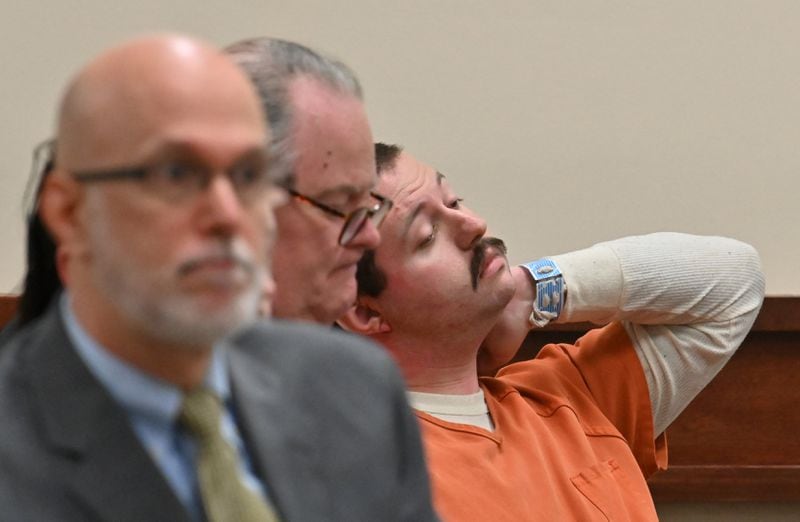 February 14, 2020 Rome - Michael Helterbrand (right) reacts as he sits with his attorney Radford Bunker (center) during a bond hearing at Floyd County Superior Court in Rome on Friday, February 14, 2020. A judge denied bond to Two men accused of belonging to a white supremacist group that allegedly plotted to kill a Bartow County couple, overthrow the government and start a race war. (Hyosub Shin / Hyosub.Shin@ajc.com)