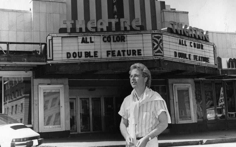 An April 25, 1983 photo of George LeFont, then the new owner of the Plaza Theatre, standing in front of the theater marquee.