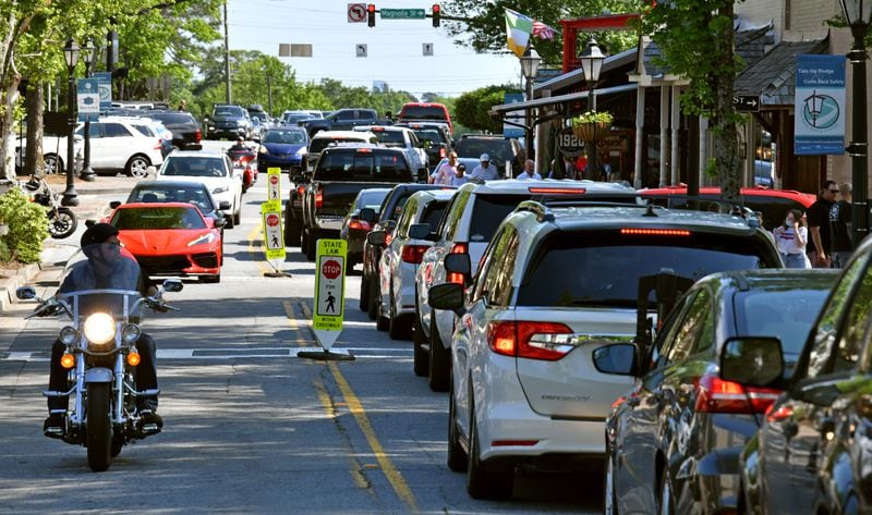 May 8, 2021 Roswell - Heavy traffic is shown along Canton Street in downtown Roswell on Saturday, May 8, 2021. Roswell is working to manage future development of the old downtown while preserving its historic look, but some business owners question whether changes will add to current problems. (Hyosub Shin / Hyosub.Shin@ajc.com)
