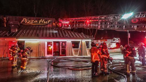 Firefighters responded to a fire early Wednesday at a Pizza Hut in DeKalb County, officials said. 