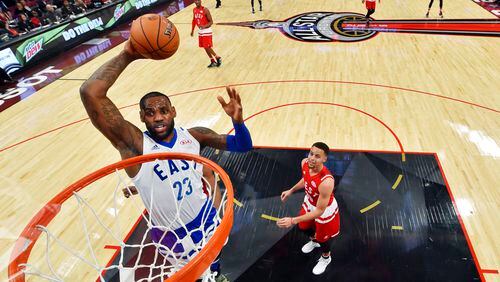 Eastern Conference's LeBron James, of the Cleveland Cavaliers, (23) slam dunks the ball against the Western Conference during second half NBA All-Star Game basketball action in Toronto on Sunday, Feb.14, 2016. (Bob Donnan/The Canadian Press via AP. Pool)