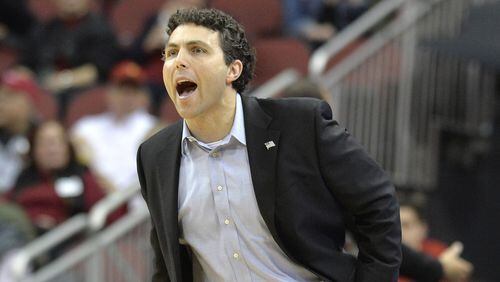 Georgia Tech coach Josh Pastner shouts instructions to his team during the first half of an NCAA college basketball game against Louisville, Thursday, Feb. 8, 2018, in Louisville, Ky. (AP Photo/Timothy D. Easley)