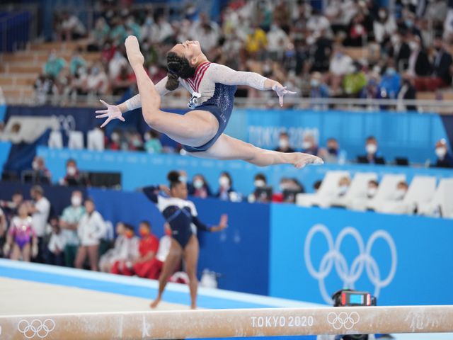 Sunisa Lee of the United States performs on the balance beam during the women's all-around gymnastics competition at the postponed 2020 Tokyo Olympics in Tokyo on Thursday, July 29, 2021. She won the all-around gold medal. (Chang W. Lee/The New York Times)