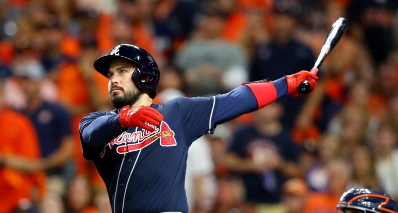Atlanta Braves catcher Travis d'Arnaud hits a solo home run during the second inning against the Houston Astros in game 2 of the World Series at Minute Maid Park, Wednesday October 27, 2021, in Houston, Tx. Curtis Compton / curtis.compton@ajc.com