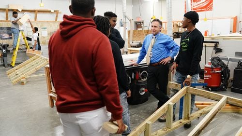 Fulton County Superintendent Mike Looney visits a woodshop class at the South Learning Center on Friday, December 13, 2019, in Atlanta. Fulton is the largest charter system in Georgia. (Elijah Nouvelage for The Atlanta Journal-Constitution)