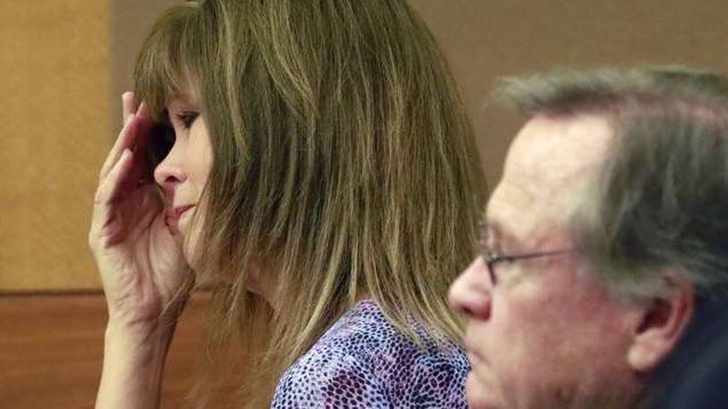 Janna Thompson listens to testimony from Max Stephens’ mother in Fulton County Superior Court on Wednesday. Thompson is on trial for second-degree murder, stemming from Max’s death at her home day care in Alpharetta. BOB ANDRES /BANDRES@AJC.COM