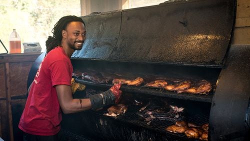 Bryan Furman in the smokehouse at B’s Cracklin’ Barbecue in Riverside. CONTRIBUTED BY MIA YAKEL