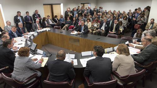 Lobbyists fill the spectator seats inside a Senate Finance Committee meeting during the 2017 legislative session. Since the General Assembly took up ethics reform in 2013, lobbyists have spent $4 million in gifts to public officials. DAVID BARNES / AJC