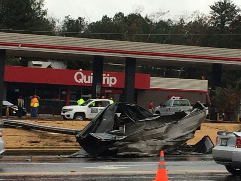 A QuikTrip is closed off Mabelton Parkway after a trees fell down and caused a gas leak.