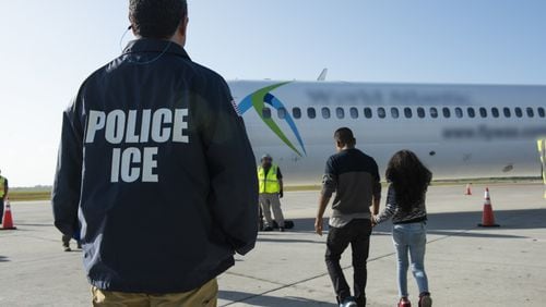 U.S. Immigration and Customs Enforcement officials carrying out a removal flight to Guatemala on Aug. 20. Photo by Keith Gardner, U.S. Immigration and Customs Enforcement
