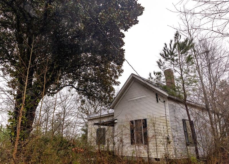 A University of Georgia study recently outlined the history and need for preservation of a tract of land in eastern Gwinnett that runs near GA 316.  The area of about 2,000 acres includes a farmhouse from 1894, a water well, one of the oldest dirt road in the state and several homesteads where only a chimney or dandelions remain as a marker on Thursday, Feb 3, 2022.  The Rowen Study suggests environmentally conscious development with trails and historical highlights.  (Jenni Girtman for The Atlanta Journal Constitution)