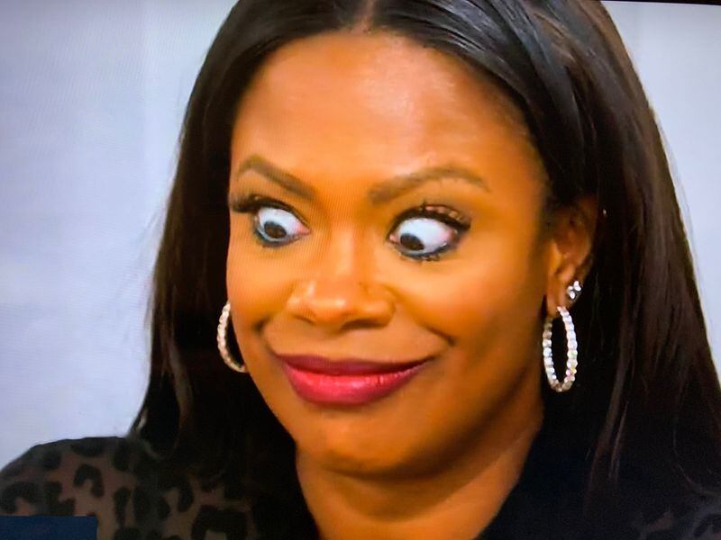 Kandi Burruss does her classic bug-eyed look as LaToya Ali shadily gifts Drew Sidora a wig during the latest episode of "Real Housewives of Atlanta" (season 13, episode 8) that aired Sunday, january 31, 2021. BRAVO