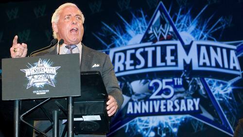 FILE - In this March 31, 2009, file photo, wrestler Ric Flair attends the 25th Anniversary of WrestleMania press conference at the Hard Rock Cafe in New York. Flair, whose "Wooooooo!" call during promos and matches became one of the most imitated catchphrases in sports, thought he would die. Alive, and with a new lease on life, Flair tells The Associated Press he's done drinking and vows to clean up his act with whatever time he has left. (AP Photo/Charles Sykes, File)