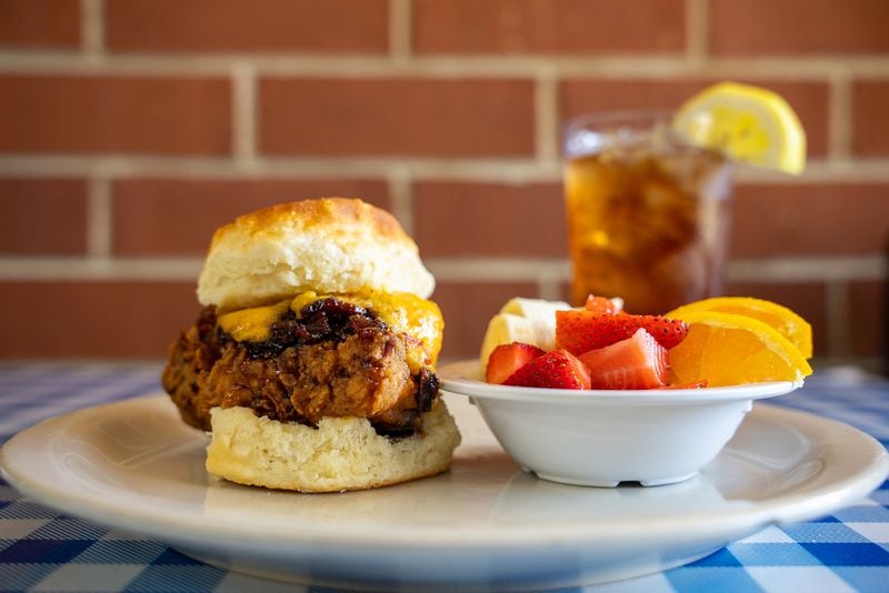 The Midnight Rider biscuit at H&H, named after a classic song of Gregg Allman's, features fried chicken, pimento cheese and bacon jam on a hot biscuit. Courtesy of Jesse Horton