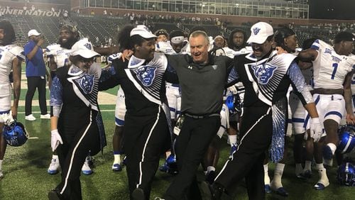 Georgia State coach Shawn Elliott dances with the band after the 41-25 win over Charlotte on Sept. 16, 2023.