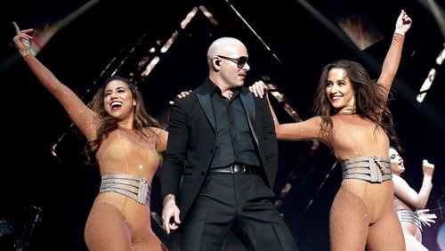 Pitbull and Prince Royce will bring Latin-flavored pop to Philips Arena on Thursday. Photo: Getty Images.