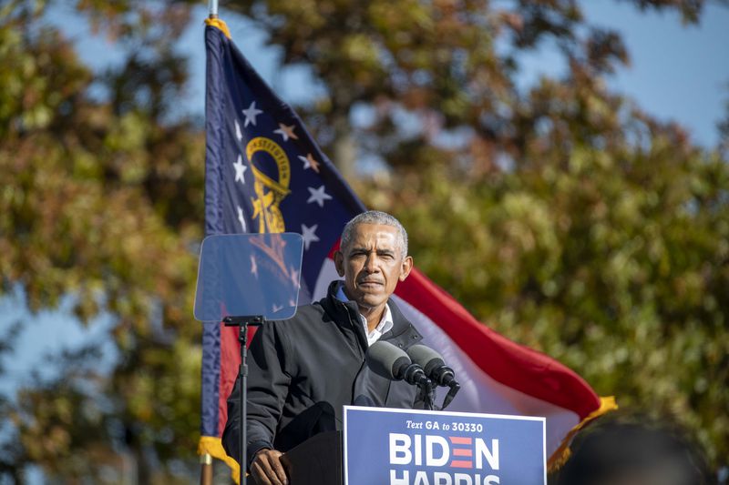 Former President Barack Obama, shown campaigning earlier this month in Atlanta’s Summerhill community, says visits to the state by high-profile politicians are not as important in determining the outcome of an election as the people working daily in the state to help their candidates. (Alyssa Pointer / Alyssa.Pointer@ajc.com)