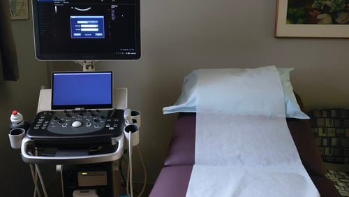 An ultrasound examination room at Atlanta Morning Center, a pregnancy center in Dunwoody whose mission is to end abortion that opened in January 2022 as a free option for low-income pregnant women or women who have limited or no access to health care seeking medical help. The center reports that it's still serving the same number of clients as before Roe v. Wade was overturned. While the number of abortions have dropped by nearly half in the state since the state's fetal cardiac law was allowed to take effect following last year's overturning of Rose, according to data from the Georgia Department of Public Health, some abortion clinics also say they remain nearly as busy as before. (Natrice Miller/natrice.com@ajc.com)