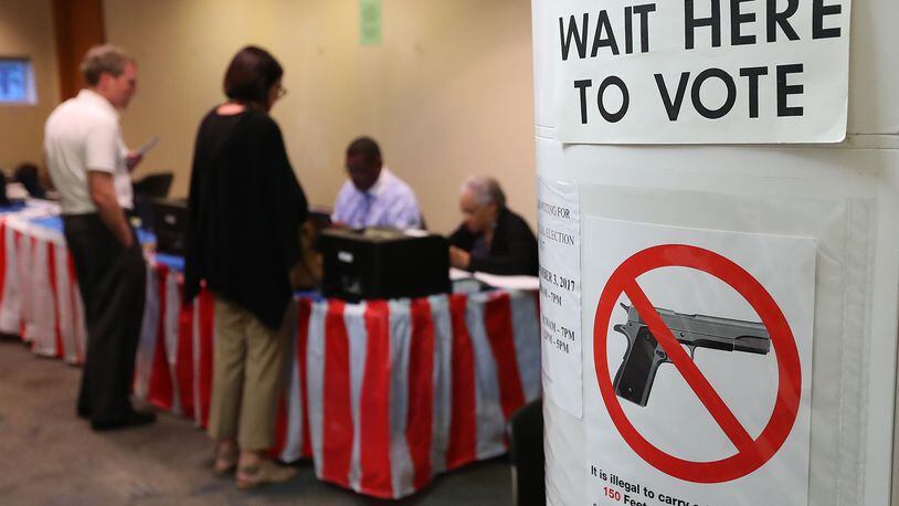Voters went to the polls this month for local elections. A lawsuit by the Libertarian Party of Georgia is seeking to make it easier for third-party candidates for the U.S. House of Representatives to appear on Georgia ballots. Curtis Compton/ccompton@ajc.com