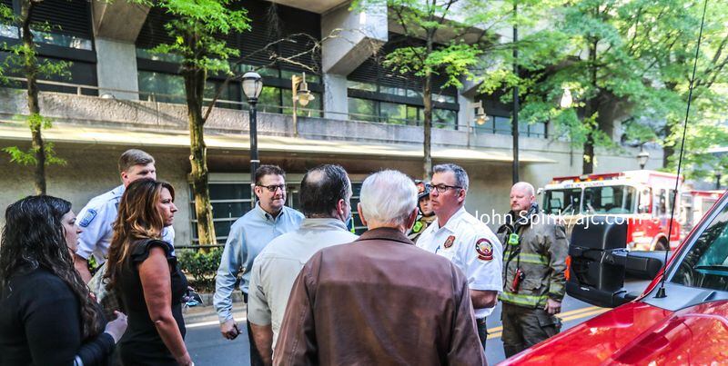 Workers rushed out of the building on West Peachtree Street after the explosion was reported. It later was determined to be safe.