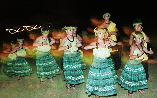 Watch hula dancers