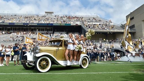 Georgia Tech's Ramblin' Wreck leads the band, cheerleaders, players, and coaches before the start of the home game against the Citadel at Bobby Dodd Stadium on Saturday, September 14, 2019. (Hyosub Shin / Hyosub.Shin@ajc.com)