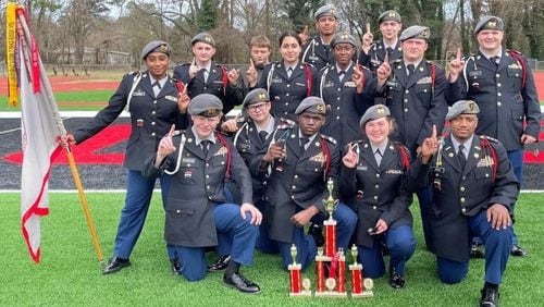 The Alexander Cougar Battalion Exhibition Team won 1st place in Squad Exhibition in the 2021 Regional Drill meet held March 6 at Osborne High School. Pictured: (Back row) David Griffith, Amari Lightford and John Eliott; (Middle row) Helen Laguna (holding guidon), Wesley Young, Danna Cabello, Brianna Gayle, Justin Dutton and Brian Blanton; (Front row) Kason Rainwater, Aiden McCleary, Alvarez Cowins, Haley Alexander and Aleczander Sykes