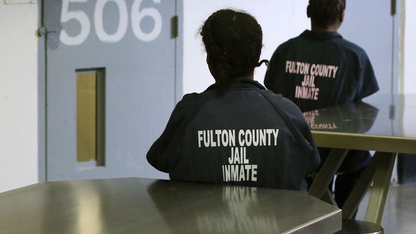 A few female inmates are shown inside Fulton County Jail  in Atlanta, Ga., June 6, 2013. JASON GETZ / JGETZ@AJC.COM