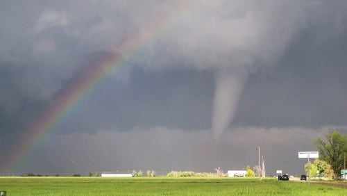 Storm chasers captured a tornado and rainbow side by side at the Texas-Oklahoma border near Vernon, Texas. (Image: Ryan Shepard via Twitter screenshot)