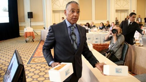Actor Giancarlo Esposito passes out boxes of "Los Pollos Hermanos" chicken (Photo by Frederick M. Brown/Getty Images)
