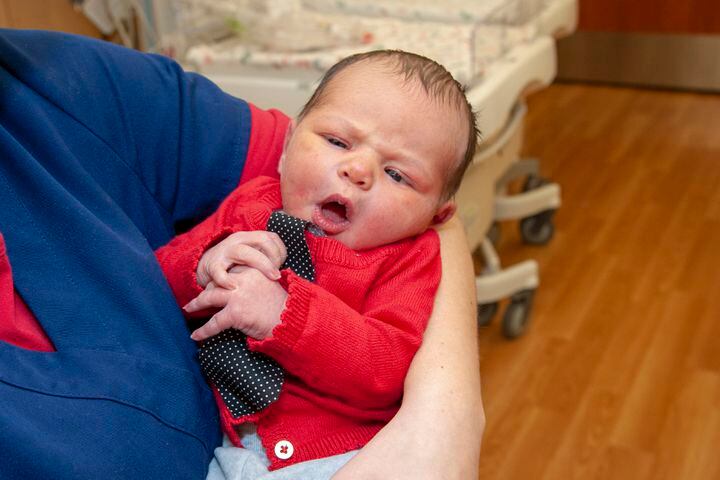Photos: Babies dressed in cardigans to honor Mr. Rogers