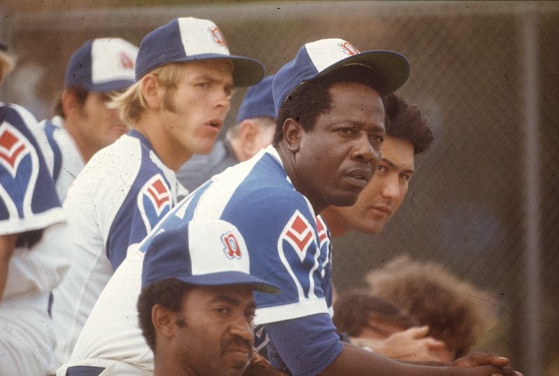 In 1974, as Hank Aaron was approaching Babe Ruth’s home run record, he received a host of death threats and racist taunts. “I just wanted to play baseball,”  Aaron said.(Guy Ferrell / The Palm Beach Post)
