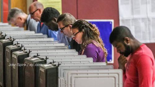 Georgians cast ballots in this AJC file photo.