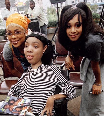 Lopes and Tionne "T-Boz" Watkins with fan