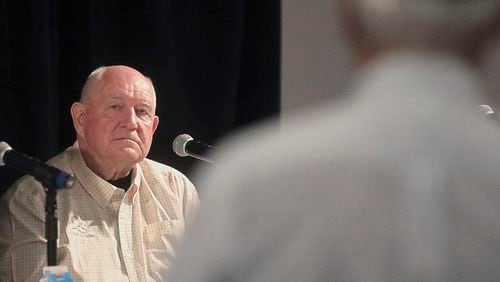 U.S. Secretary of Agriculture Sonny Perdue listens to a question from a Wisconsin farmer during a town hall meeting at the World Dairy Expo in Madison, Wis. Tuesday, Oct. 1, 2019. (John Hart/Wisconsin State Journal via AP)