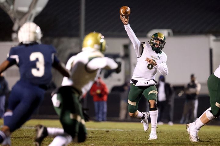 Dec. 18, 2020 - Norcross, Ga: Grayson quarterback Jake Garcia (8) throws a touchdown pass to wide receiver Jamal Haynes, left, in the first half against Norcross in the Class AAAAAAA semi-final game at Norcross high school Friday, December 18, 2020 in Suwanee, Ga.. JASON GETZ FOR THE ATLANTA JOURNAL-CONSTITUTION