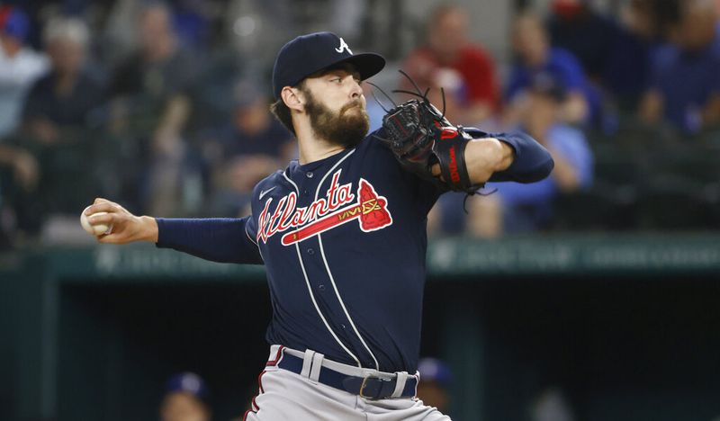 Atlanta Braves starting pitcher Ian Anderson throws against the Texas Rangers during the first inning of a baseball game Friday, April 29, 2022, in Arlington, Texas. (AP Photo/Ron Jenkins)