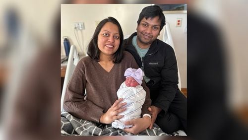 Shikha Goel and Dhruv Goyal with their newborn baby girl on Jan. 1, 2024. The baby girl was Northside Hospital Atlanta's first baby delivered in the new year. (Northside Hospital Atlanta)
