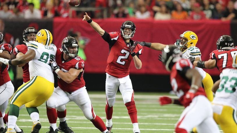 October 30, 2016 ATLANTA: Matt Ryan completes a pass under pressure from the Packers during the first half in an NFL football game on Sunday, Oct. 30, 2016, in Atlanta. Curtis Compton /ccompton@ajc.com