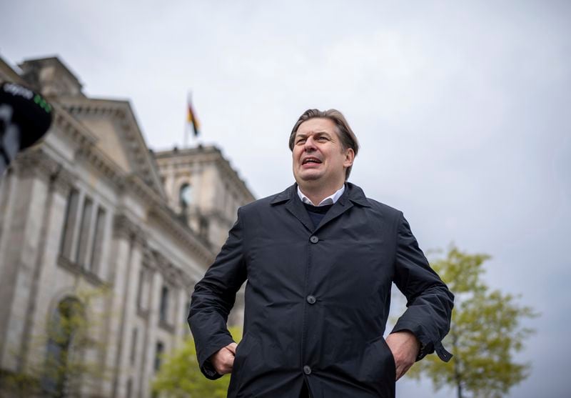 Maximilian Krah, AfD lead candidate for the European elections, leaves after a press statement after talks with the AfD parliamentary group leadership, Wednesday, April 24, 2024, in Berlin. One of Krah's employees is suspected of spying for China. (Michael Kappeler/dpa via AP)