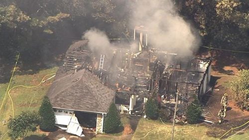 A home in Lawrenceville collapsed during a Wednesday afternoon fire.