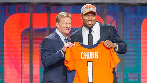 Apr 26, 2018; Arlington, TX, USA; Bradley Chubb (North Carolina State) poses with NFL commissioner Roger Goodell after being selected as the number five overall pick to the Denver Broncos in the first round of the 2018 NFL Draft at AT&amp;T Stadium. Mandatory Credit: Tim Heitman-USA TODAY Sports