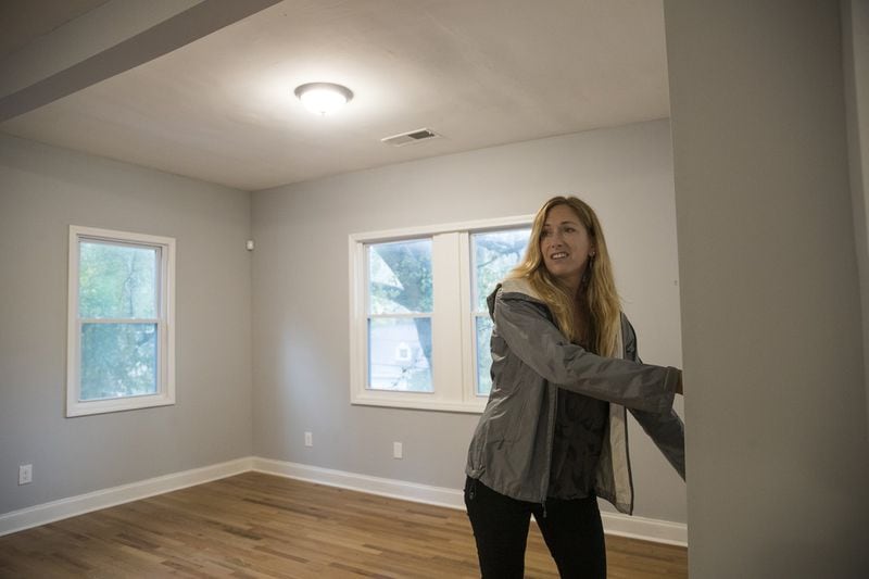 Kim Wachtel, real estate broker, in her newly purchased investment property in October as she talks about her hopes for the Cascade Road community’s growth in Southwest Atlanta. (Alyssa Pointer/Atlanta Journal Constitution)