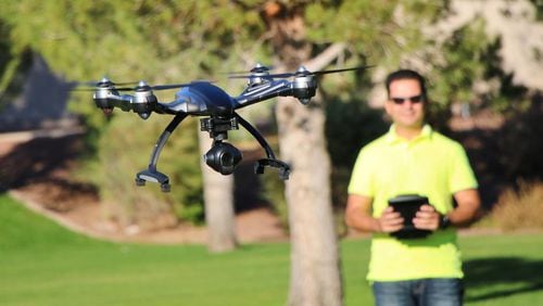 Roswell has adopted a measure prohibiting unauthorized drone operations from city property, including parks. AJC FILE